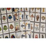 Cigarette Cards, Wills, a collection of sets to include Ships Badges, Arms of Foreign Cities,