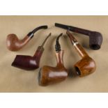 Five Danish briar pipes, comprising an N.O. Larsen super black 100 rustic cherry coloured bowl, a