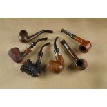 A collection of European briar pipes, including two Oldenkott, a Wood Art carved rustic, a Czech