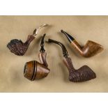 Four Danish briar estate pipes, comprising a Zettervig straight grain with marked stem, a C Half