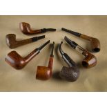 A collection of seven French made briar pipes, including three Butz Choquin pipes, comprising a