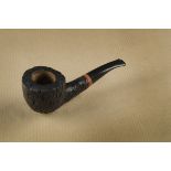 An R.V.Wiley estate briar pipe, the rusticated bowl and shank, marked R.V.W Handmade