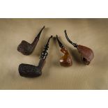 Four freehand carved briar pipes, mostly Danish, two polished bowls and two rustic carved