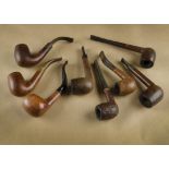 A collection of eight briar pipes, including a KBB Yellow Bolle 'Chin Rester', a small Barling and