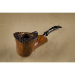 A large Karl Erik briar hand made pipe, the straight grain with sandblasted rims, marked to