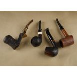 Two Danske Club briar pipes, including a curved Vanio, with rustic and part polished bowl, a