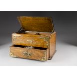 An 19th century oak and brass mounted cigar cabinet, of rectangular shape with pull out drawer