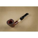 A Newlook unsmoked briar pipe, the straight shape, with sleeve, with smooth bowl, sandblasted rim,