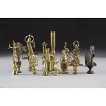 A large quantity of brass and other metal pipe tampers, and desk seals including claw and ball,