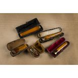 Four amber and gold cigar/cheroot holders, tapered form one marked 18ct another 9ct two unmarked and