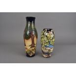 Two Moorcroft design trial vases, one of elongated baluster form and in the Country Trees pattern