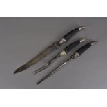 A neo-classical design carving set, with Sheffield 1906 silver mounted, reeded black handles, Rd