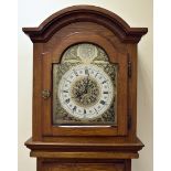 A modern oak cased long case clock, with German movement, 199 cm high