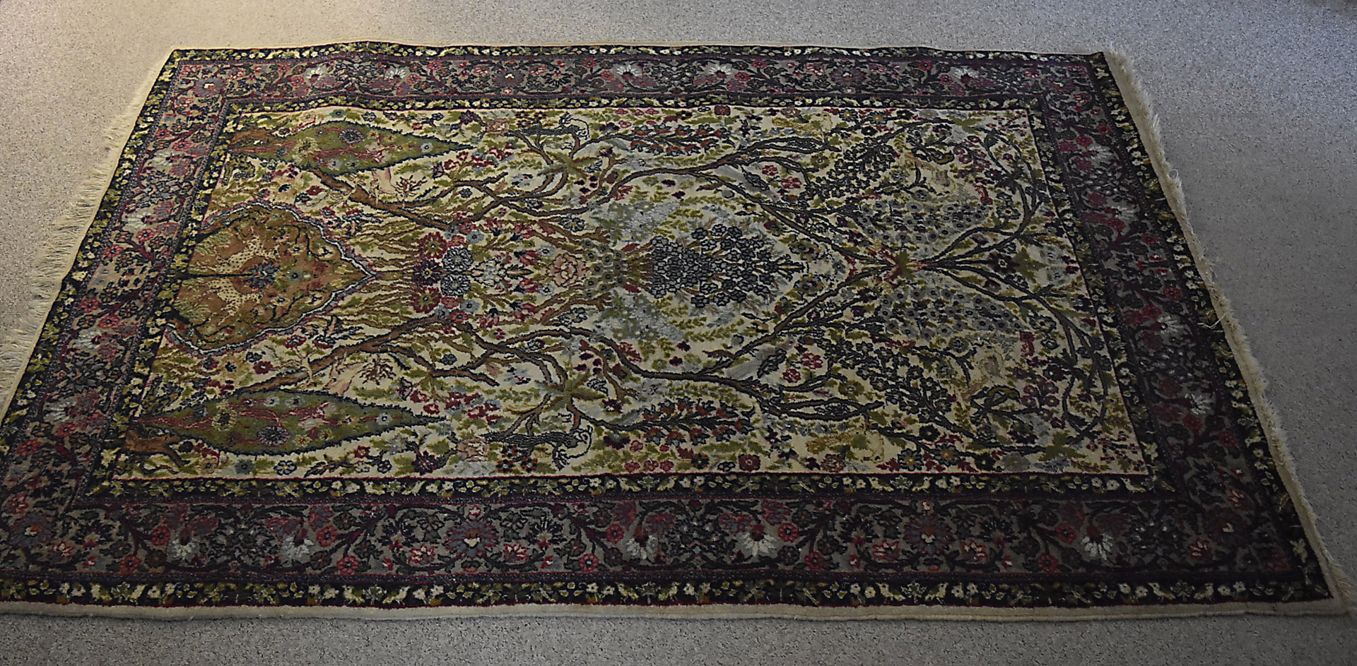 A Persian carpet, sometimes called a Tree of Life carpet, finely knotted, decorated with animals and - Image 2 of 3