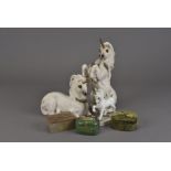 A collection of unicorn figures, and painted boxes including a family by Windston of North Hollywood