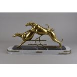 An art deco figure group, titled Course de Levriers par Rochard, depicting a pair of gilt spelter