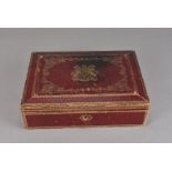A Victorian royal red leather document box, of rectangular form with tooled decoration centred