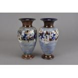 A pair of Royal Doulton Eliza Simmance stoneware vases, the apple blossom on a light and dark blue