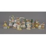 A collection of Border Fine Arts Beatrix Potter characters, and snow globes, including The Taylor of