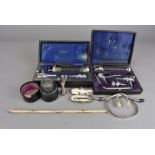 A small group of vintage medical equipment, including two cased otoscope, the component parts of a