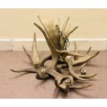 A large antler chandelier, thought to be late 20th century, approx. 90 cm dia.