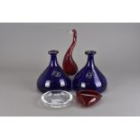 A collection of glassware, including a red glass standing duck on clear glass base, 34 cm high (af),