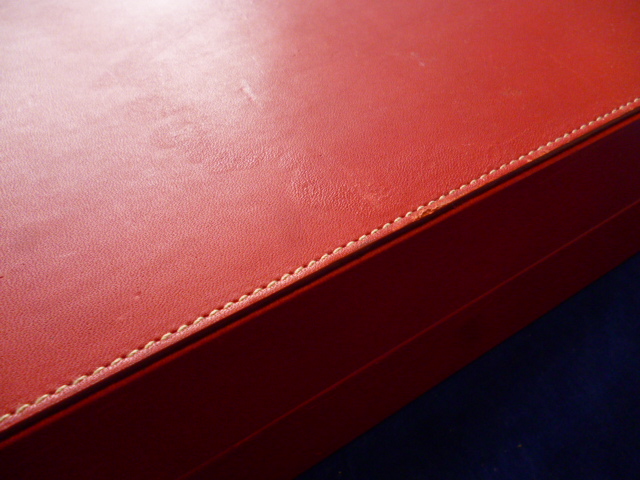 A red leather cased Asprey backgammon board, with leather counters and numbered die, marked Asprey - Image 5 of 8