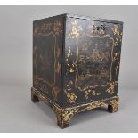 A 19th century jappaned table cabinet, as a Japanese kudansu, with temple reserves to a floral