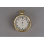 A compensated pocket barometer, with gold plated finish, 5 cm dia., and complete with original