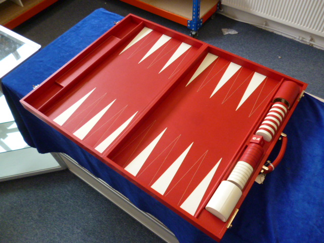 A red leather cased Asprey backgammon board, with leather counters and numbered die, marked Asprey - Image 7 of 8