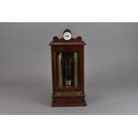 A W.H Ell's Patent Safecheck Gold Changer, in mahogany and brass, 46 cm high x 21 cm wide x 18 cm