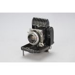 A Kodak Bantam Special Camera, 828 Art Deco folding camera with an F2/45mm Ektar lens no.ER355,