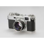 A Nikon S2 Rangefinder Camera, chrome, serial no. 6185310, with Nikkor-S.C f/1.4 50mm lens,