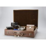 A Plaubel Makina II Outfit, presented in a magnificent gentleman’s attaché style case, black face