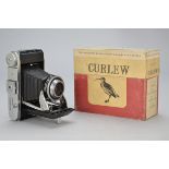 A Kershaw Curlew III Camera, chrome, serial no. 3/6713, with Taylor Hobson Royal f/3.8 105mm lens,