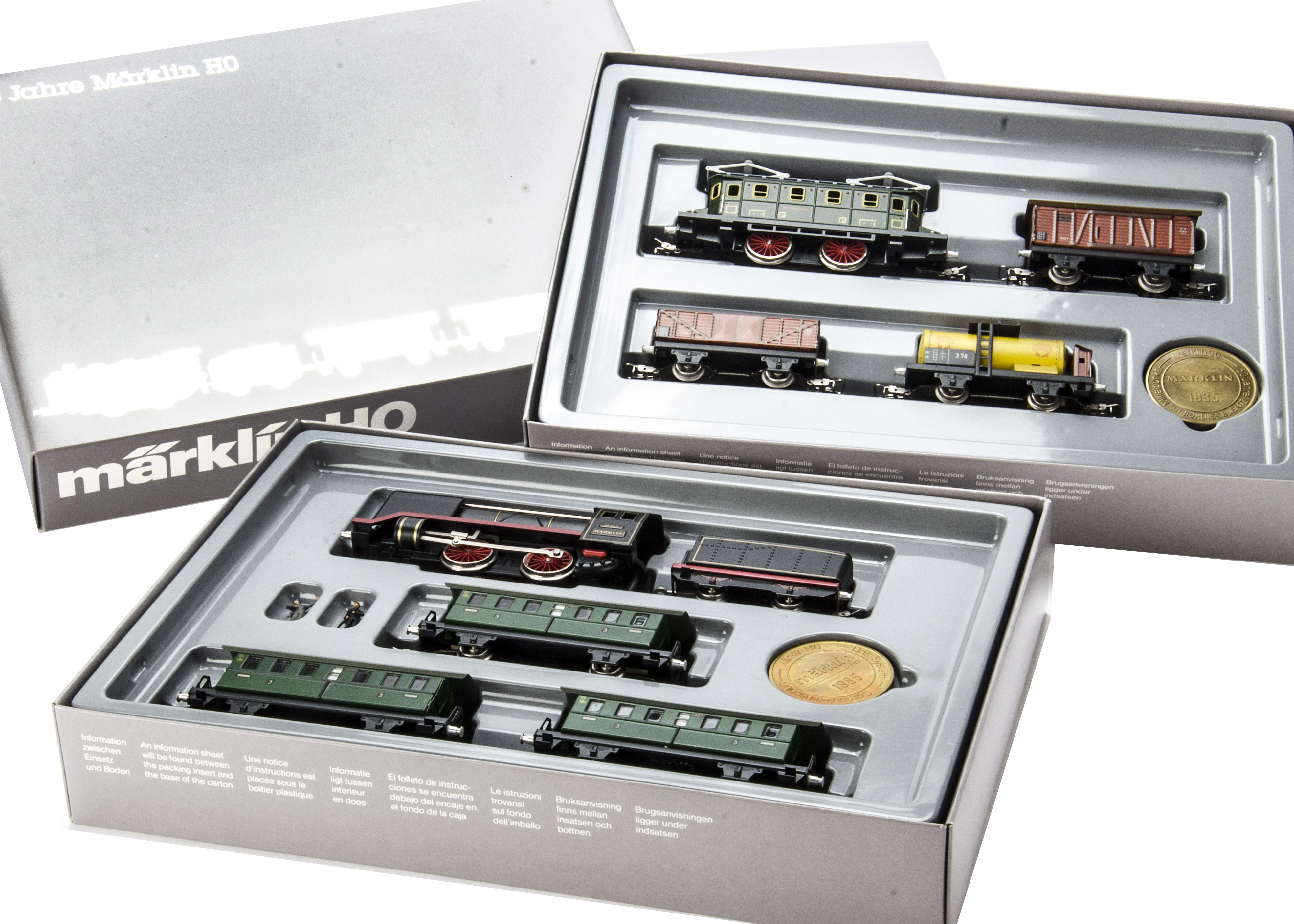 A Marklin HO Gauge 50th Anniversary 3-rail Two-Train Set, reference 0050, comprising retro-style