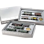 A Marklin HO Gauge 50th Anniversary 3-rail Two-Train Set, reference 0050, comprising retro-style