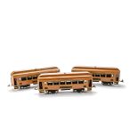 Lionel O Gauge New York Central Coaching Stock, a rake of three cars in orange NYC Lines livery, two