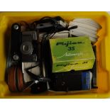 Camera related literature and accessories, to include Canon, Minolta, Fujica 35mm camera, cables
