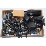 A collection of SLR cameras, to include Olympus OM10 and lenses, Minolta, Canon etc together with