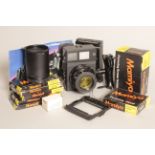 Mamiya Press Universal Camera, with 100mm lens and a range of accessories, many boxed (a lot)