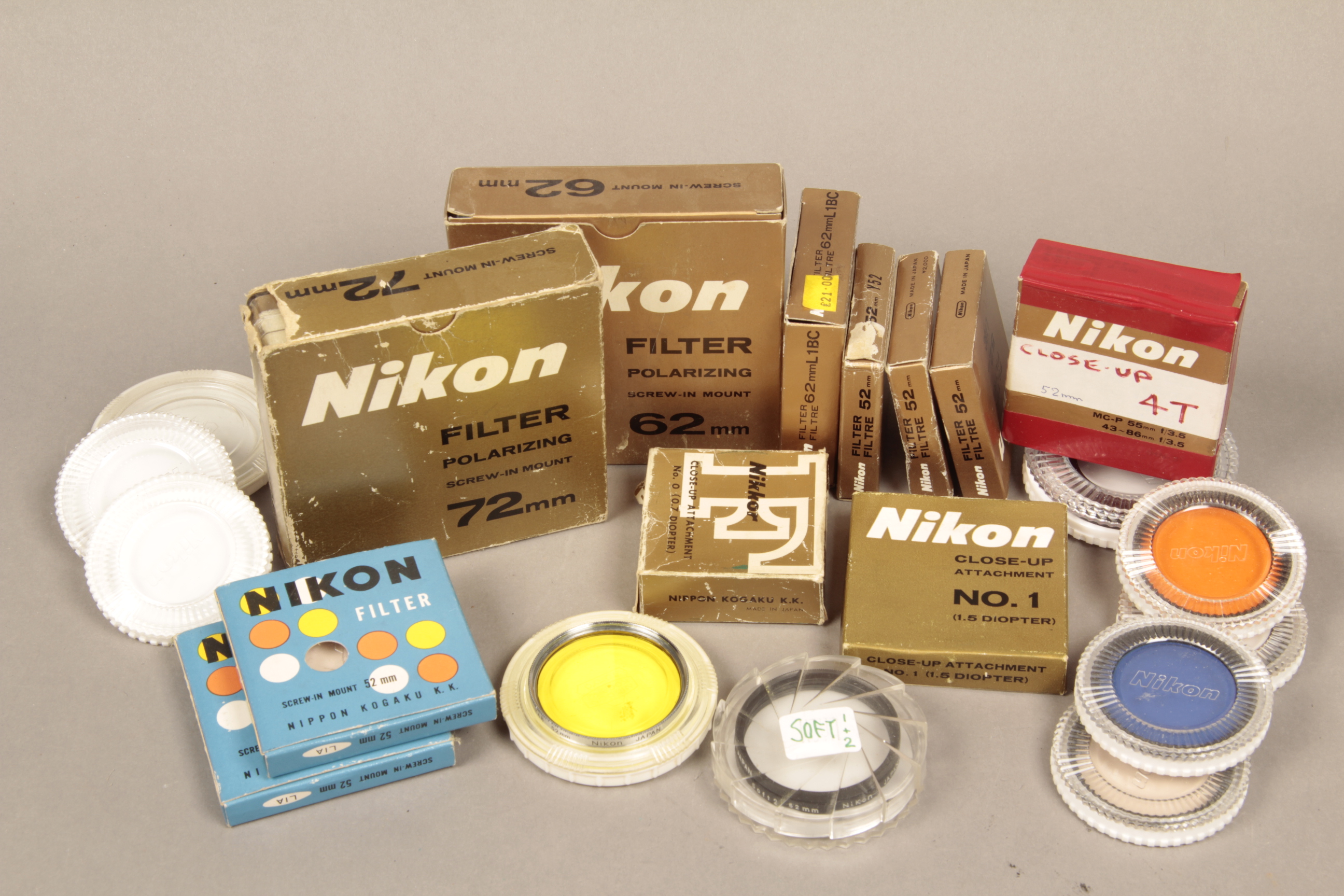 Nikon Filters and Close-up Lenses, an assortment including early chrome ring filters, 62mm and