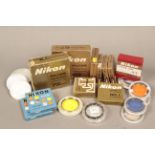Nikon Filters and Close-up Lenses, an assortment including early chrome ring filters, 62mm and