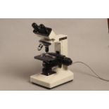 A Nikon Alphaphot YS Microscope, with 10, 40 and 100 objectives, Abbe condenser, 10 eyepieces,