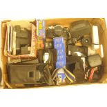 A collection of camera related accessories, to include Olympus OM10, lenses, flash units etc