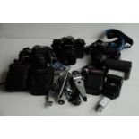SLR and compact cameras, three Praktica cameras and accessories in aluminium carrying case
