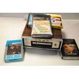 Eight track player + cartridges, National player plus approximately one hundred cartridges of