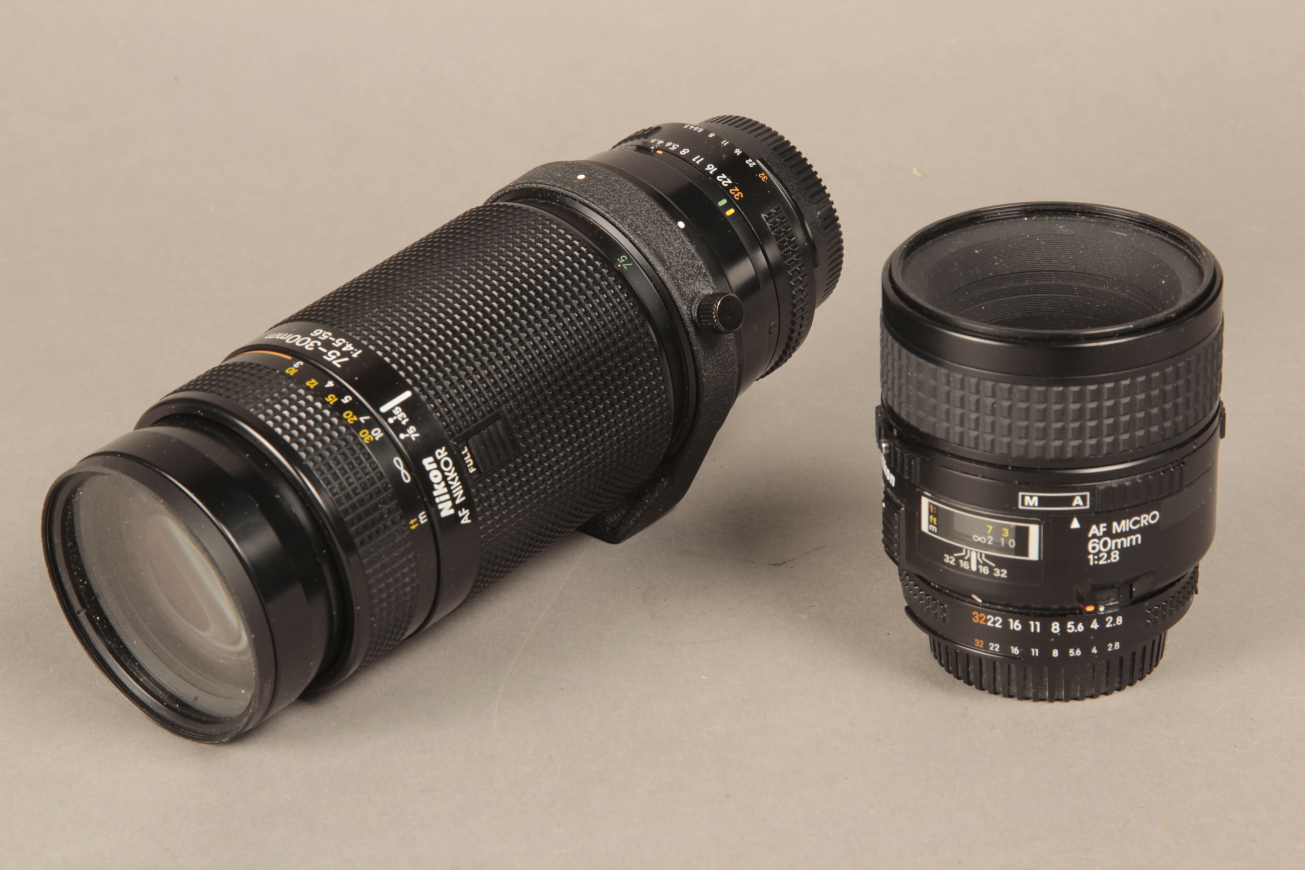 A Nikon AF Micro 60mm Lens, F2.8, also an AF Nikkor 75-300 F4.5-5.6 Lens (2)