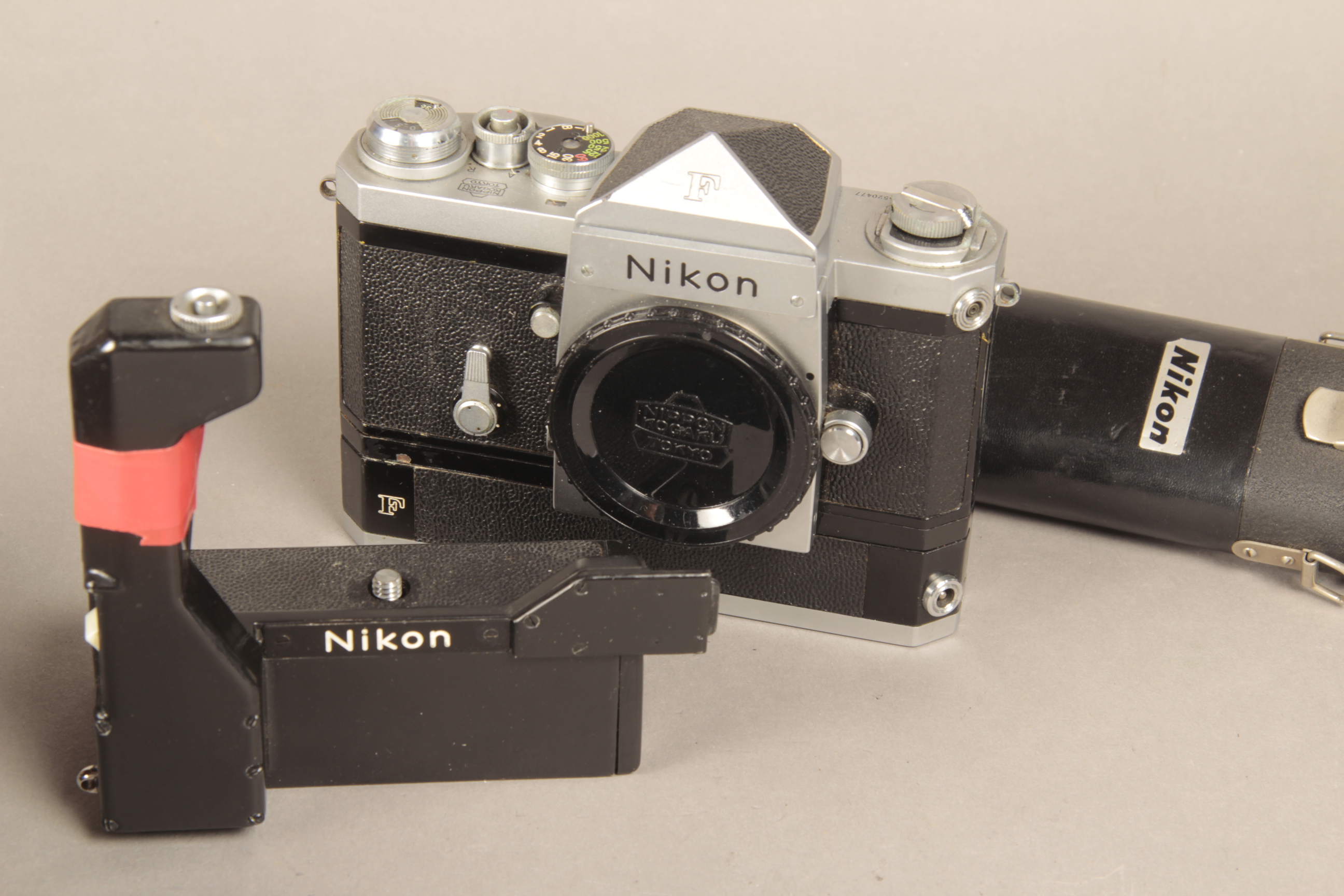 A Nikon F Chrome Body with F36 Motor Drive, with plain prism finder, cordless battery pack and