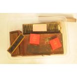 Three boxes of magic lantern slides, to include 3 1/4 inch slides and wooden mounted lantern